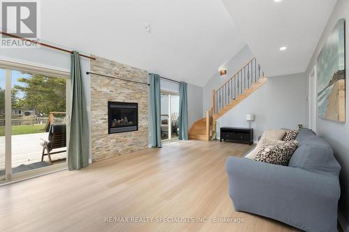 67 Turtle Path, Ramara (Brechin), ON - Indoor Photo Showing Living Room With Fireplace