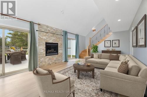 67 Turtle Path, Ramara (Brechin), ON - Indoor Photo Showing Living Room With Fireplace