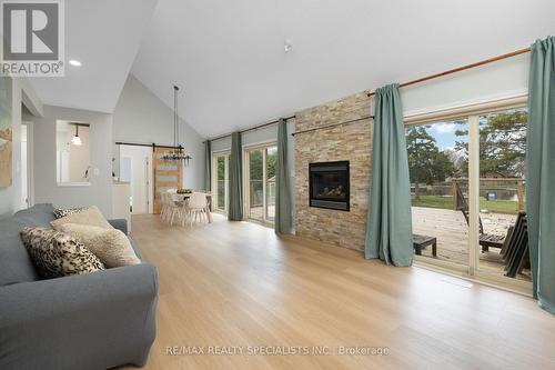 67 Turtle Path, Ramara, ON - Indoor Photo Showing Living Room With Fireplace