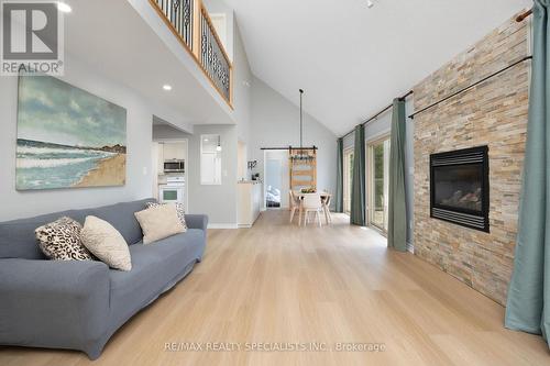 67 Turtle Path, Ramara, ON - Indoor Photo Showing Living Room With Fireplace