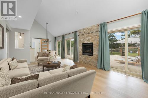 67 Turtle Path, Ramara (Brechin), ON - Indoor Photo Showing Living Room With Fireplace