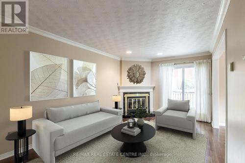 23 - 3125 Pinemeadow Drive, Burlington, ON - Indoor Photo Showing Living Room With Fireplace