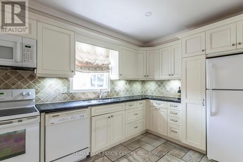 23 - 3125 Pinemeadow Drive, Burlington, ON - Indoor Photo Showing Kitchen With Double Sink