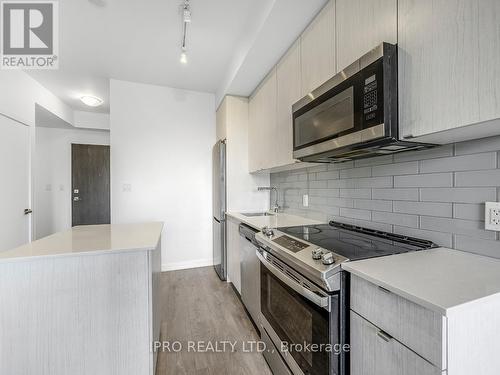 422 - 1401 O'Connor Drive, Toronto, ON - Indoor Photo Showing Kitchen With Stainless Steel Kitchen With Upgraded Kitchen