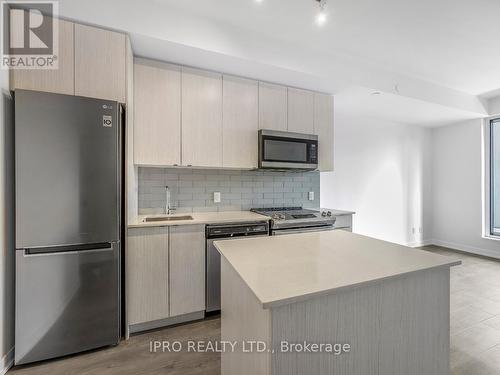 422 - 1401 O'Connor Drive, Toronto, ON - Indoor Photo Showing Kitchen With Stainless Steel Kitchen