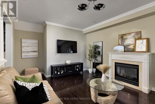 2223 Whistling Springs Crescent, Oakville (West Oak Trails), ON - Indoor Photo Showing Living Room With Fireplace