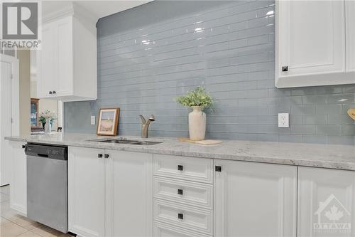 Stylish modern kitchen - 615 Longfields Drive Unit#302, Ottawa, ON - Indoor Photo Showing Kitchen With Double Sink