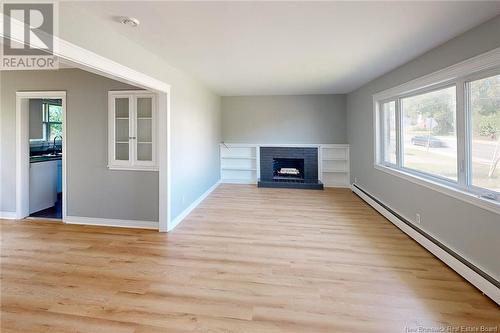 922 Smythe Street, Fredericton, NB - Indoor Photo Showing Living Room With Fireplace