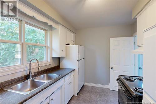 922 Smythe Street, Fredericton, NB - Indoor Photo Showing Kitchen With Double Sink