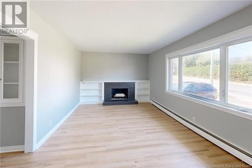 922 Smythe Street, Fredericton, NB - Indoor Photo Showing Living Room With Fireplace