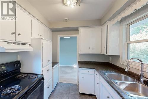 922 Smythe Street, Fredericton, NB - Indoor Photo Showing Kitchen With Double Sink