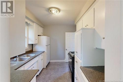 922 Smythe Street, Fredericton, NB - Indoor Photo Showing Kitchen With Double Sink