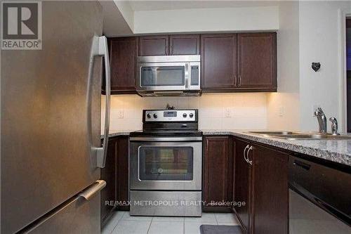 715 - 19 Grand Trunk Crescent, Toronto, ON - Indoor Photo Showing Kitchen With Double Sink