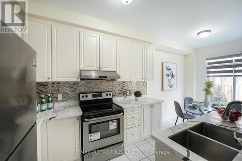 16 Yellowknife Road, Brampton, ON - Indoor Photo Showing Kitchen With Double Sink