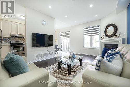 16 Yellowknife Road, Brampton, ON - Indoor Photo Showing Living Room With Fireplace