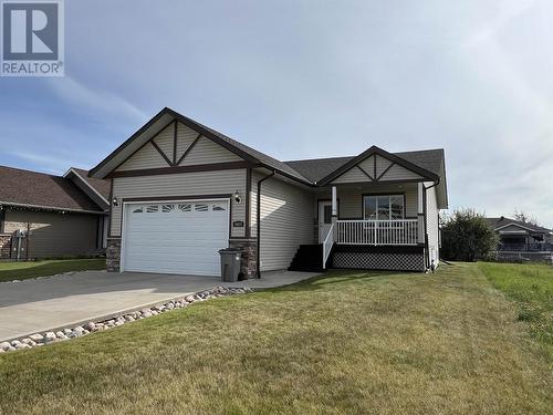 5617 Birch Drive, Fort Nelson, BC - Outdoor With Deck Patio Veranda With Facade