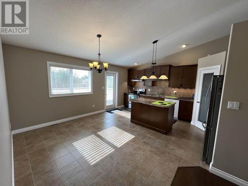 5617 Birch Drive, Fort Nelson, BC - Indoor Photo Showing Kitchen