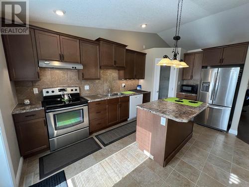 5617 Birch Drive, Fort Nelson, BC - Indoor Photo Showing Kitchen With Double Sink