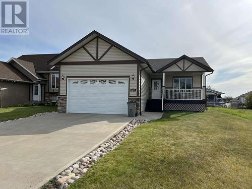 5617 Birch Drive, Fort Nelson, BC - Outdoor With Deck Patio Veranda With Facade