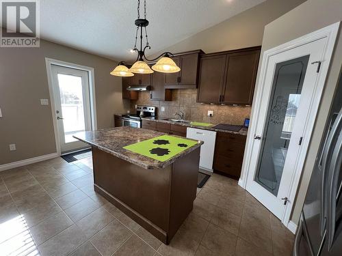 5617 Birch Drive, Fort Nelson, BC - Indoor Photo Showing Kitchen