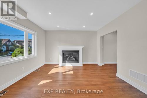 38 Macdonald Street, Toronto, ON - Indoor Photo Showing Living Room With Fireplace