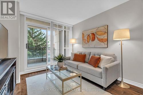 206 - 2379 Central Park Drive, Oakville, ON - Indoor Photo Showing Living Room