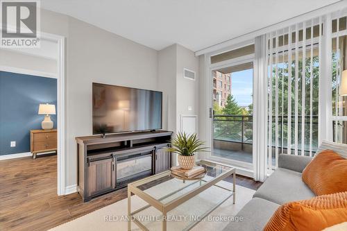 206 - 2379 Central Park Drive, Oakville, ON - Indoor Photo Showing Living Room