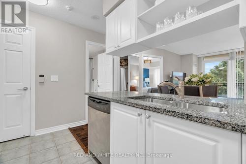 206 - 2379 Central Park Drive, Oakville, ON - Indoor Photo Showing Kitchen With Double Sink