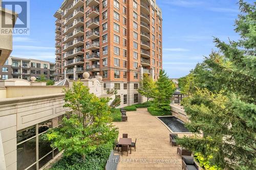 206 - 2379 Central Park Drive, Oakville, ON - Outdoor With Balcony With Facade