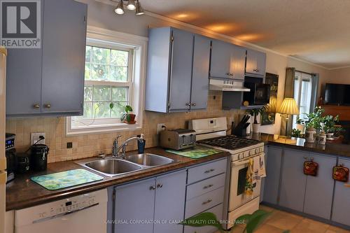 16 Grace Court, Bayham (Port Burwell), ON - Indoor Photo Showing Kitchen With Double Sink