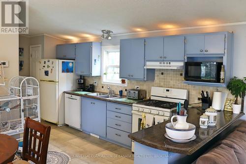 16 Grace Court, Bayham (Port Burwell), ON - Indoor Photo Showing Kitchen With Double Sink