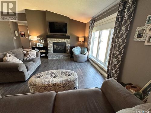 507 Anderson Drive, Hudson Bay, SK - Indoor Photo Showing Living Room With Fireplace