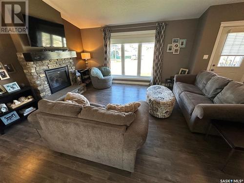 507 Anderson Drive, Hudson Bay, SK - Indoor Photo Showing Living Room With Fireplace