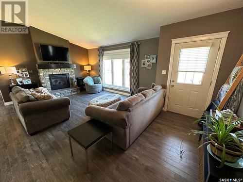 507 Anderson Drive, Hudson Bay, SK - Indoor Photo Showing Living Room With Fireplace