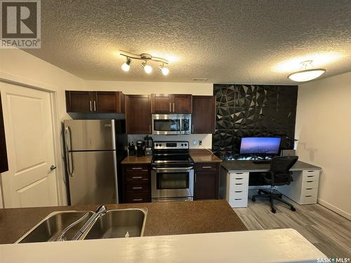 56 5565 Blake Crescent, Regina, SK - Indoor Photo Showing Kitchen With Stainless Steel Kitchen With Double Sink