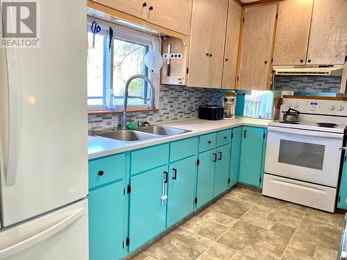 3509 East Lake Drive, Christina Lake, BC - Indoor Photo Showing Kitchen With Double Sink