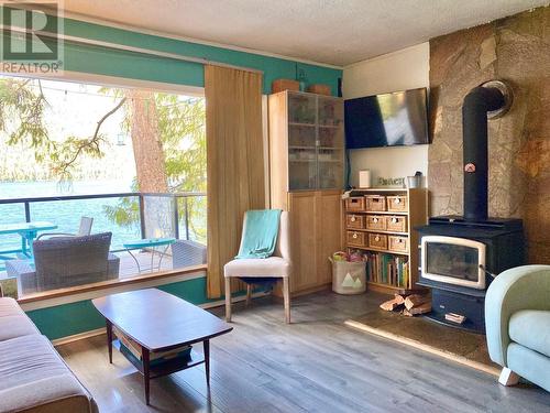 3509 East Lake Drive, Christina Lake, BC - Indoor Photo Showing Living Room With Fireplace