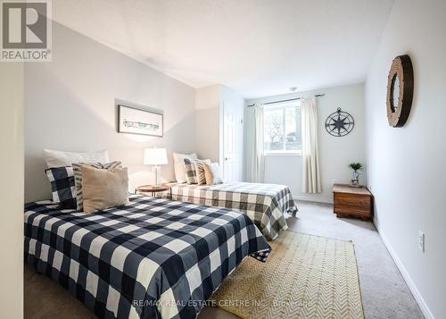 101 - 245 Queen Street W, Centre Wellington, ON - Indoor Photo Showing Bedroom