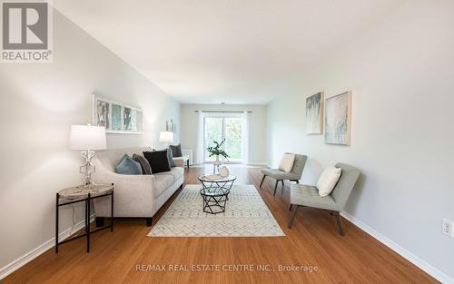 101 - 245 Queen Street W, Centre Wellington, ON - Indoor Photo Showing Living Room