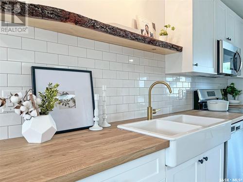 1013 7Th Street E, Saskatoon, SK - Indoor Photo Showing Kitchen With Double Sink