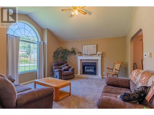 1820 First Street, Fruitvale, BC - Indoor Photo Showing Living Room With Fireplace