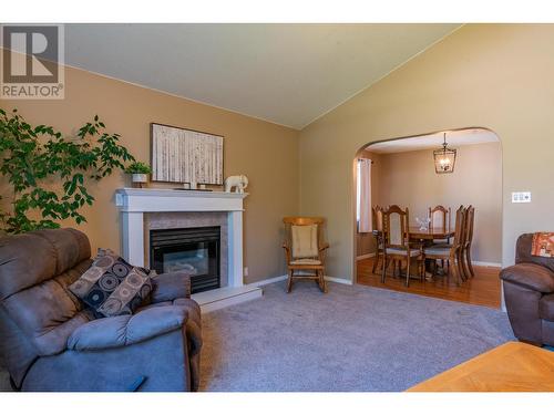 1820 First Street, Fruitvale, BC - Indoor Photo Showing Living Room With Fireplace