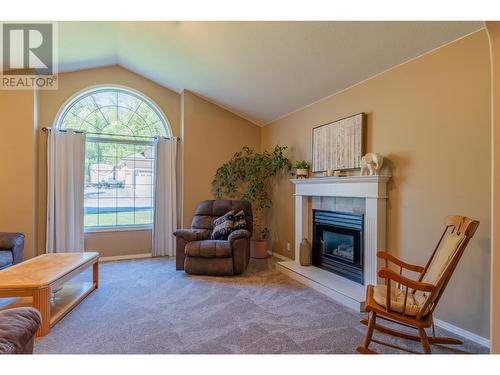 1820 First Street, Fruitvale, BC - Indoor Photo Showing Living Room With Fireplace