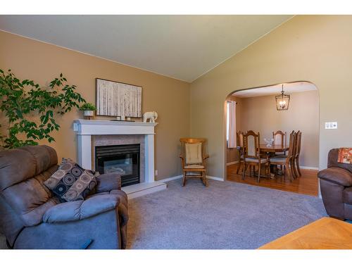 1820 First Street, Fruitvale, BC - Indoor Photo Showing Living Room With Fireplace