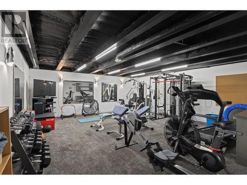 Gym with Wet Bar - 541 Barra Lane, Kelowna, BC - Indoor Photo Showing Gym Room