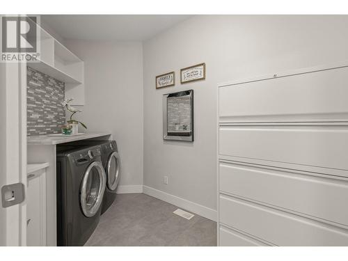 Laundry Room on Main Floor - 541 Barra Lane, Kelowna, BC - Indoor Photo Showing Laundry Room