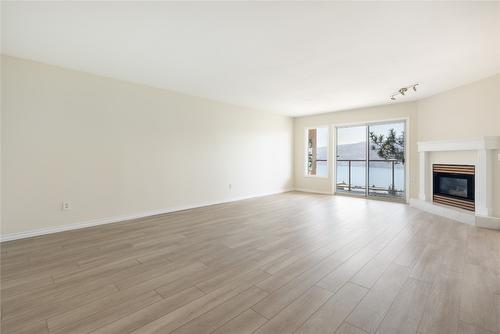 103-4630 Ponderosa Drive, Peachland, BC - Indoor Photo Showing Living Room With Fireplace