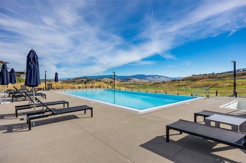 2-105 Predator Ridge Drive, Vernon, BC - Outdoor With In Ground Pool With View