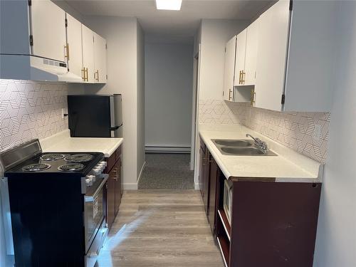 208-4101 Alexis Park Drive, Vernon, BC - Indoor Photo Showing Kitchen With Double Sink