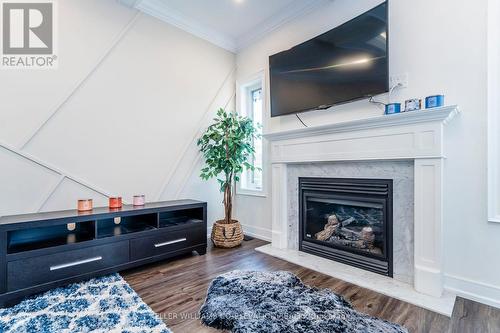 99 Mcintyre Drive, Barrie, ON - Indoor Photo Showing Living Room With Fireplace